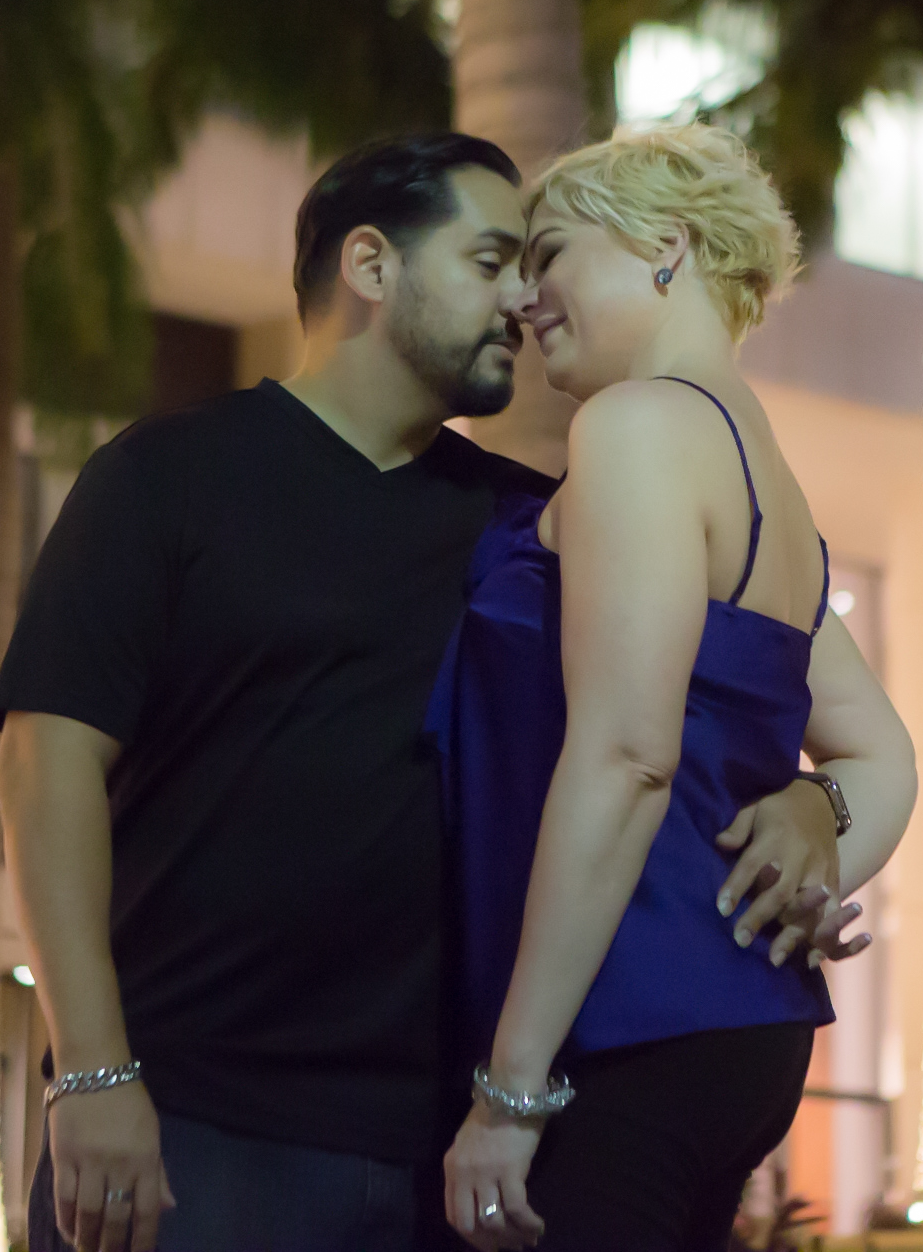 selective focus photography of couple hugging